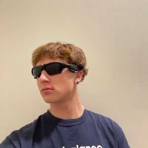 Retro sunglasses with built in earbuds